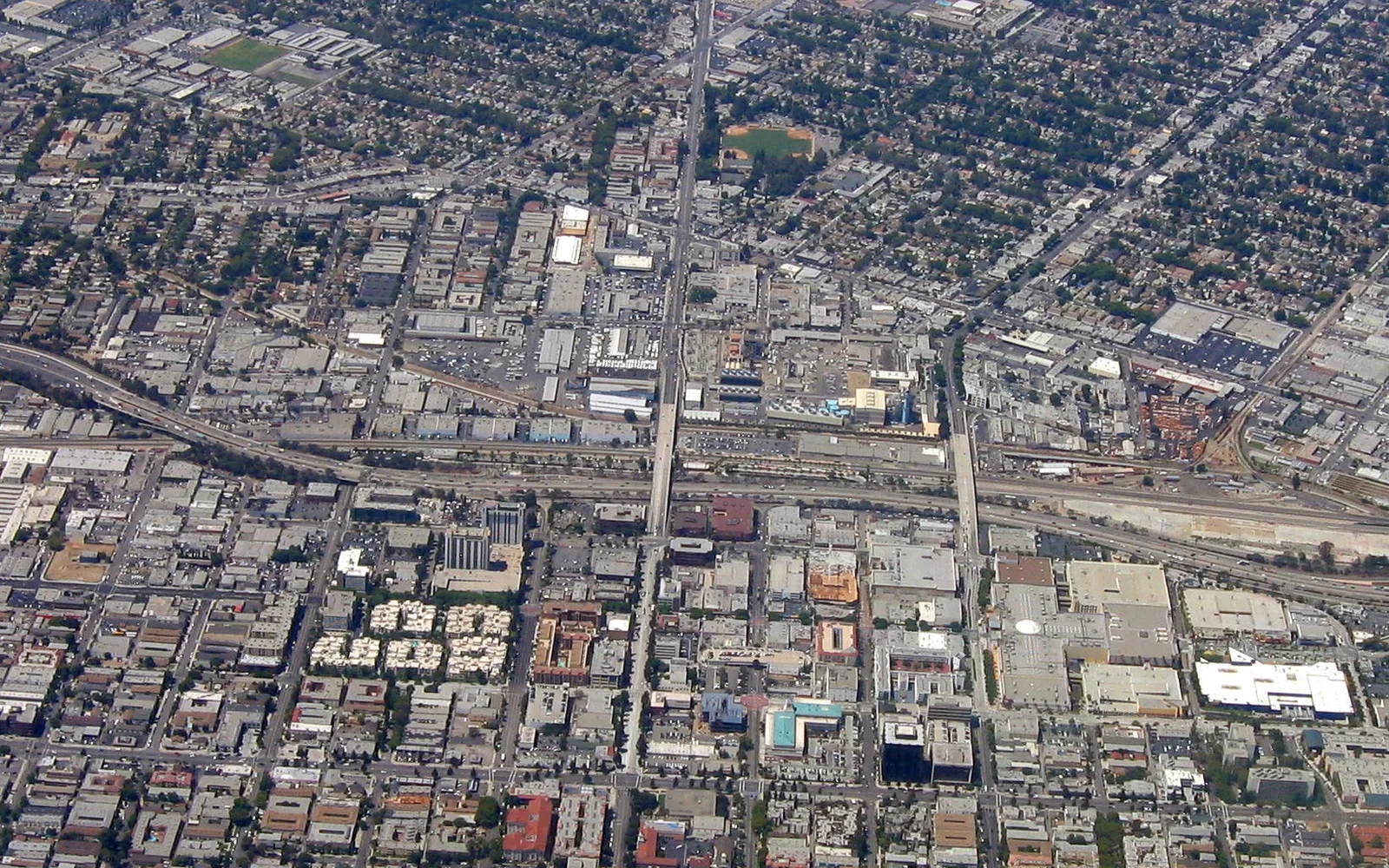 Aerial view of downtown Burbank showing urban district with buildings and streets